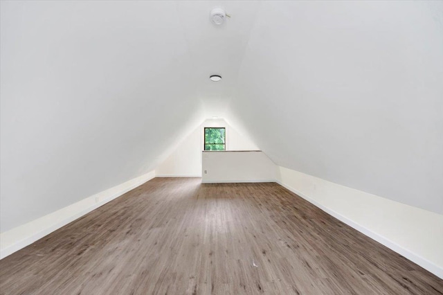 8 Pioneer Trl, Monroe, NY 10950 - bonus room with vaulted ceiling and wood finished floors