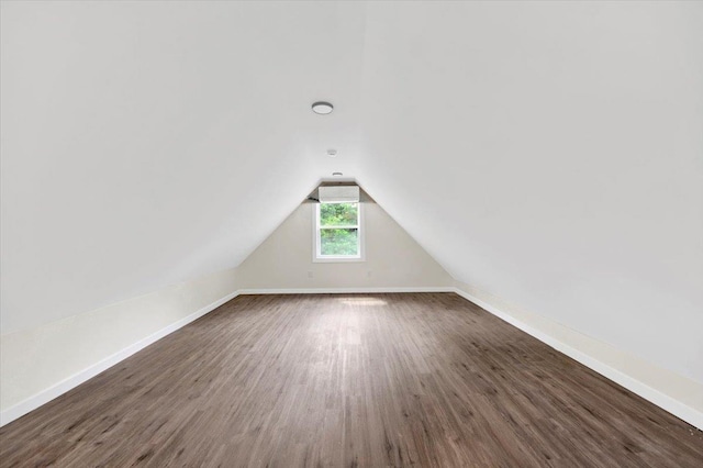 8 Pioneer Trl, Monroe, NY 10950 - additional living space with wood finished floors and vaulted ceiling
