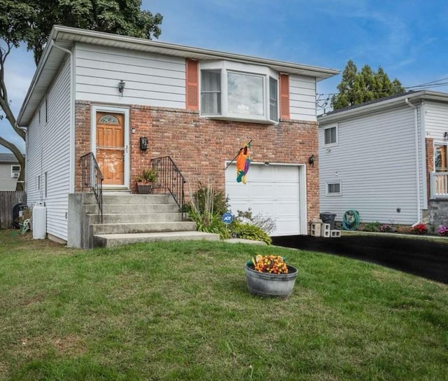 833 Bermuda Rd, West Babylon, NY 11704 - split level home featuring a garage, brick siding, driveway, and a front yard