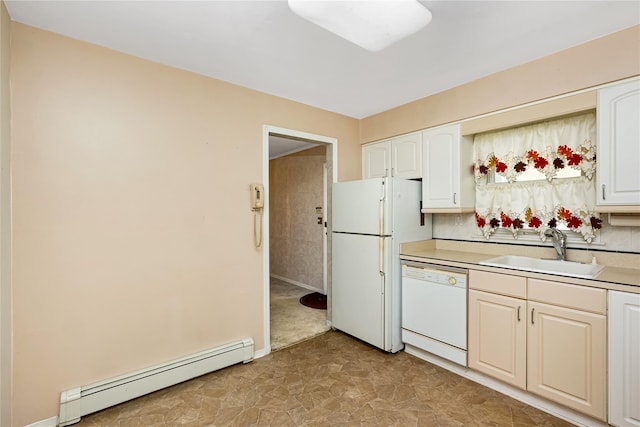 245 E Seaman Ave, Freeport, NY 11520 - kitchen with a baseboard heating unit, white appliances, light countertops, and white cabinetry