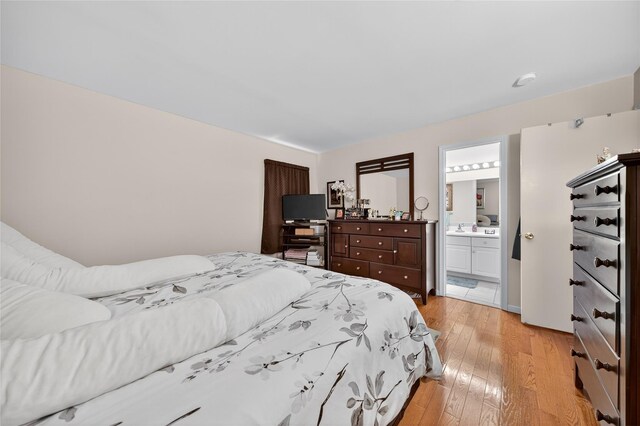 3 Stanford Dr, Highland Mills, NY 10930 - bedroom with light wood-style floors and ensuite bath