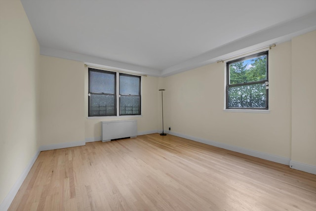 4705 Henry Hudson Pkwy W Unit 1J, Bronx, NY 10471 - unfurnished room featuring radiator and wood finished floors