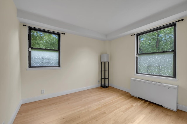 4705 Henry Hudson Pkwy W Unit 1J, Bronx, NY 10471 - unfurnished room featuring radiator heating unit and wood finished floors