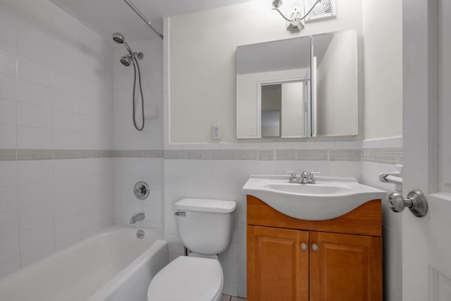 4705 Henry Hudson Pkwy W Unit 1J, Bronx, NY 10471 - bathroom with vanity, washtub / shower combination, tile walls, and wainscoting