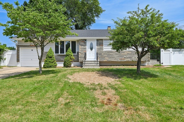 43 Walton St, Brentwood, NY 11717 - view of front of property featuring stone siding, an attached garage, and concrete driveway