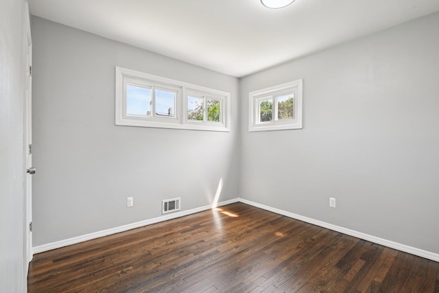 43 Walton St, Brentwood, NY 11717 - unfurnished room featuring baseboards and dark wood finished floors