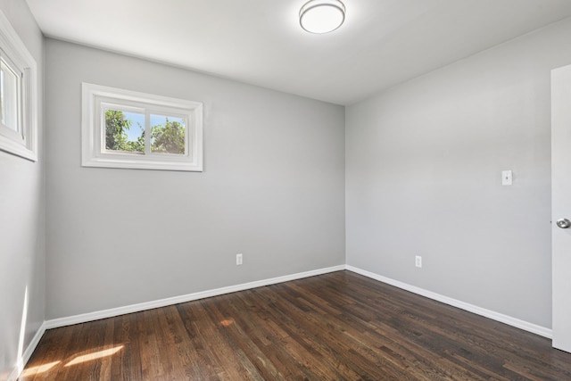 43 Walton St, Brentwood, NY 11717 - unfurnished room featuring dark wood-style flooring