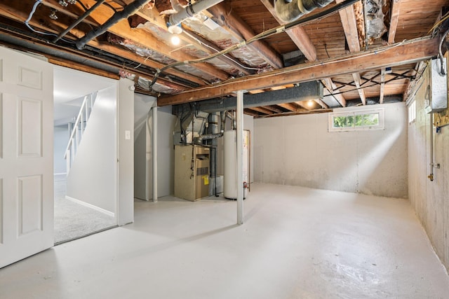 43 Walton St, Brentwood, NY 11717 - below grade area featuring gas water heater and heating unit