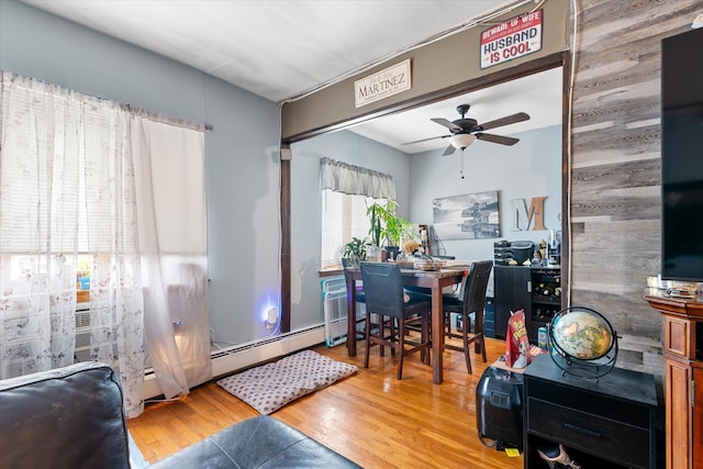 51-23 71st St, Woodside, NY 11377 - dining area featuring a ceiling fan and wood finished floors