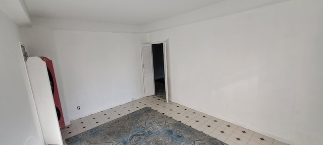 99-60 63rd Rd Unit 1B, Rego Park, NY 11374 - unfurnished room featuring tile patterned floors