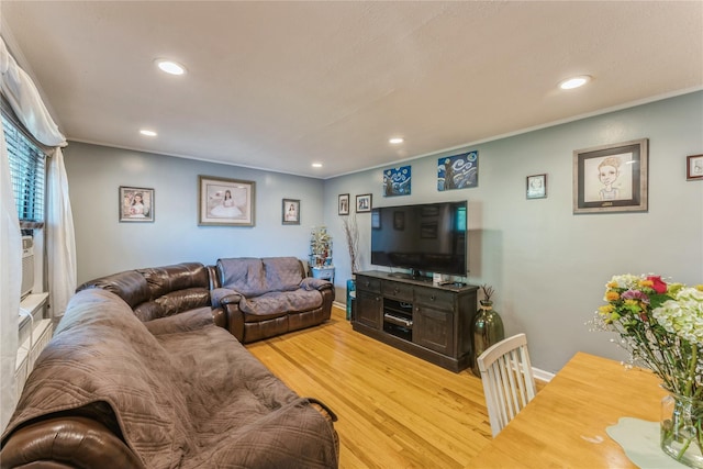 217-22 73rd Ave Upper, Upper, Oakland Gardens, NY 11364 - living room with light wood-style flooring, recessed lighting, and crown molding