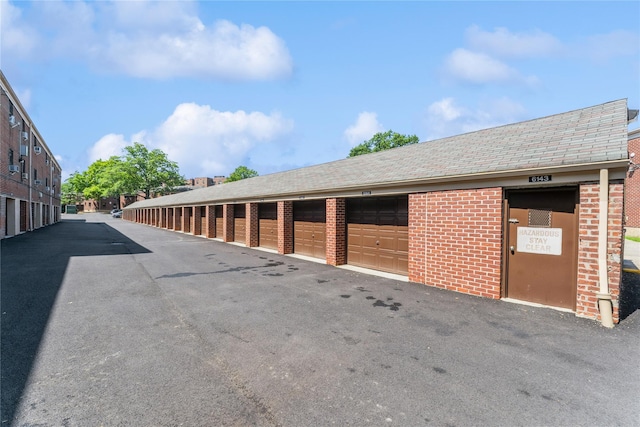 217-22 73rd Ave Upper, Upper, Oakland Gardens, NY 11364 - view of street featuring community garages