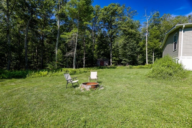 101 W Peenpack Trl, Sparrowbush, NY 12780 - view of green lawn featuring an outdoor fire pit