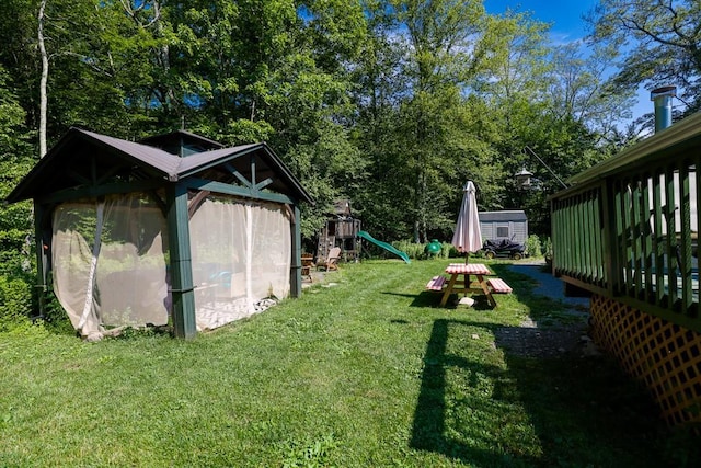 101 W Peenpack Trl, Sparrowbush, NY 12780 - view of green lawn featuring a playground and a storage unit