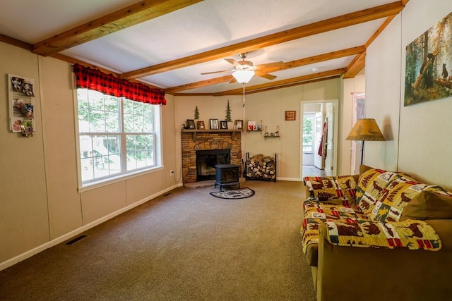 101 W Peenpack Trl, Sparrowbush, NY 12780 - living area featuring a wood stove, carpet flooring, and ceiling fan