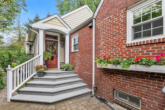 550 Nassau Blvd, West Hempstead, NY 11552 - view of exterior entry featuring brick siding