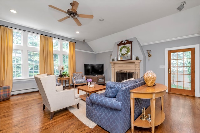 550 Nassau Blvd, West Hempstead, NY 11552 - living room with a baseboard heating unit, wood finished floors, ceiling fan, a fireplace, and recessed lighting