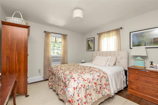 550 Nassau Blvd, West Hempstead, NY 11552 - bedroom with wood finished floors and cooling unit