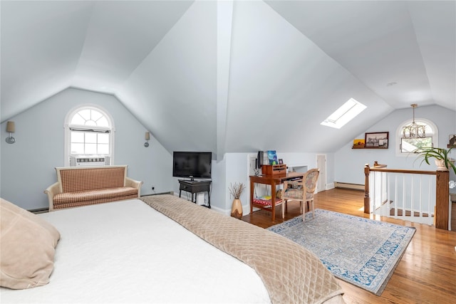 550 Nassau Blvd, West Hempstead, NY 11552 - bedroom with a skylight, vaulted ceiling, wood finished floors, a baseboard radiator, and cooling unit