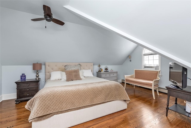 550 Nassau Blvd, West Hempstead, NY 11552 - bedroom featuring lofted ceiling, wood finished floors, and a baseboard radiator