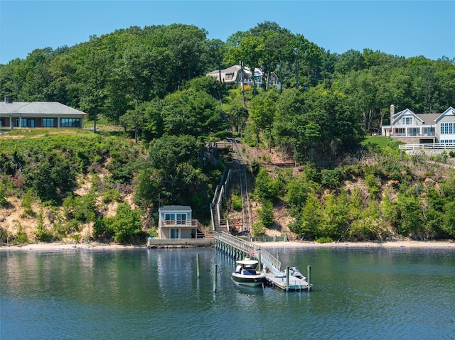 12 N Rd, Laurel Hollow, NY 11771 - water view with a floating dock and a forest