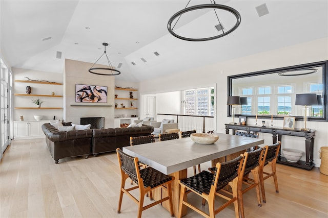 12 N Rd, Laurel Hollow, NY 11771 - dining area with light wood finished floors and high vaulted ceiling