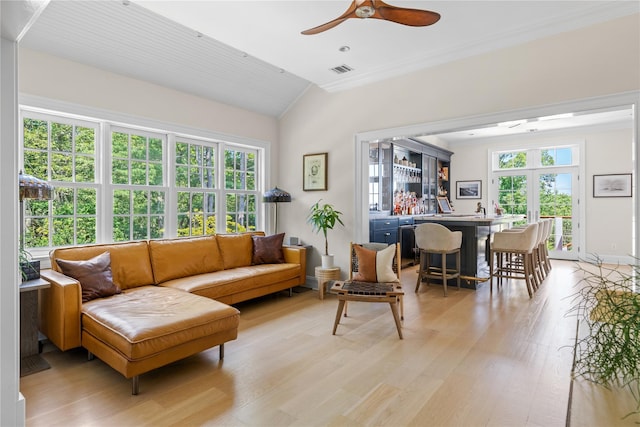 12 N Rd, Laurel Hollow, NY 11771 - living room featuring ceiling fan, a dry bar, light wood-style flooring, lofted ceiling, and ornamental molding