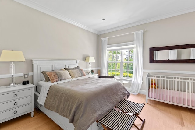12 N Rd, Laurel Hollow, NY 11771 - bedroom featuring light wood-type flooring and crown molding