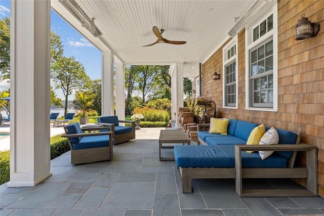 12 N Rd, Laurel Hollow, NY 11771 - covered porch with outdoor lounge area and ceiling fan