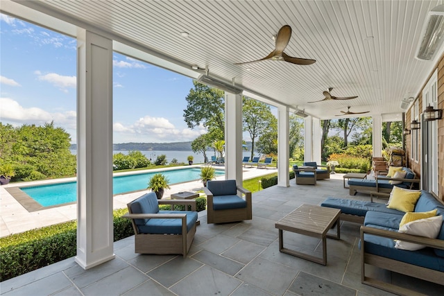 12 N Rd, Laurel Hollow, NY 11771 - view of patio with a water view, ceiling fan, and an outdoor living space