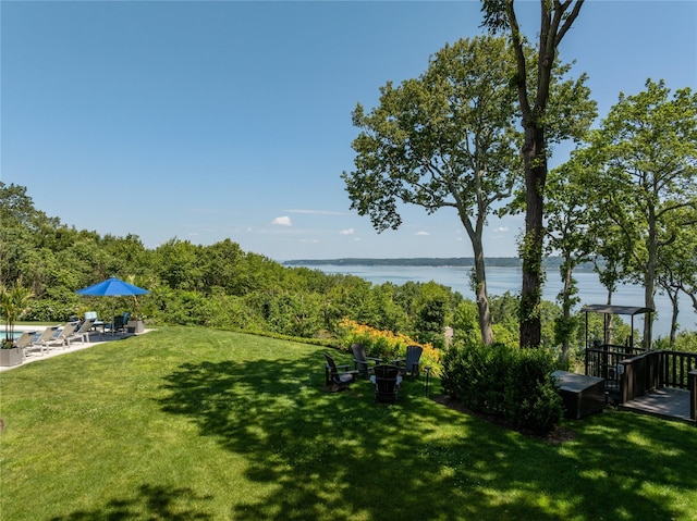 12 N Rd, Laurel Hollow, NY 11771 - view of green lawn with a water view and a patio
