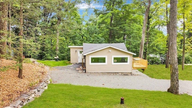 10 Pioneer Trl, Monroe, NY 10950 - view of front of property with a wooden deck and a front yard