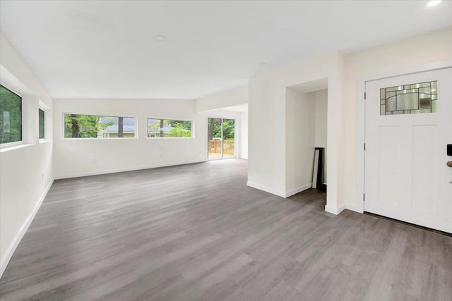 10 Pioneer Trl, Monroe, NY 10950 - unfurnished living room with plenty of natural light and wood finished floors
