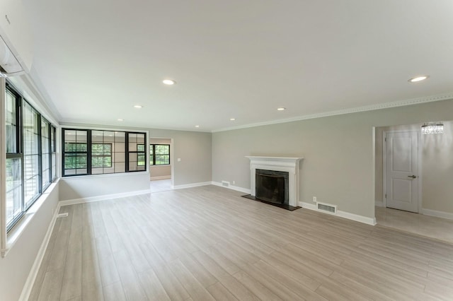 2 Foxwood Rd, Kings Point, NY 11024 - unfurnished living room featuring crown molding, light wood finished floors, a fireplace, and recessed lighting
