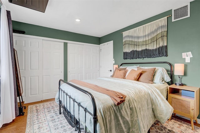 1 Anchorage Way Unit 301, Freeport, NY 11520 - bedroom featuring wood finished floors and recessed lighting