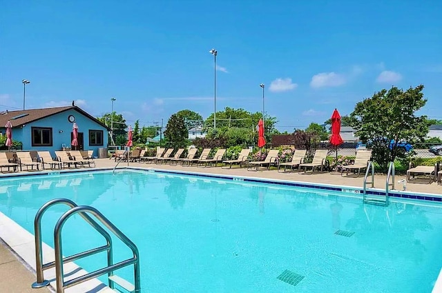 1 Anchorage Way Unit 301, Freeport, NY 11520 - community pool featuring a patio area