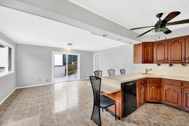 107 Croydon Rd, Yonkers, NY 10710 - kitchen featuring black dishwasher, healthy amount of natural light, open floor plan, and a peninsula