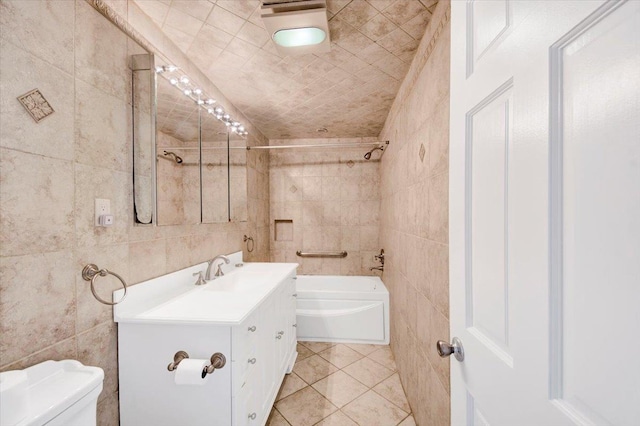 107 Croydon Rd, Yonkers, NY 10710 - full bathroom featuring tile walls, vanity, bathing tub / shower combination, and tile patterned flooring