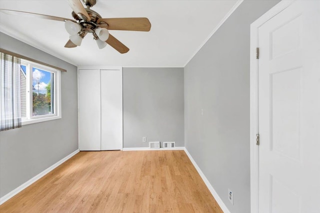 107 Croydon Rd, Yonkers, NY 10710 - spare room featuring light wood finished floors, a ceiling fan, and ornamental molding