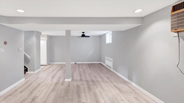 107 Croydon Rd, Yonkers, NY 10710 - below grade area with light wood-type flooring and stairway