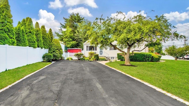 107 Croydon Rd, Yonkers, NY 10710 - view of property hidden behind natural elements with asphalt driveway