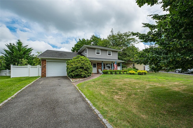 145 Fifty Acre Rd S, Smithtown, NY 11787 - view of front of house with a garage, brick siding, asphalt driveway, and covered porch