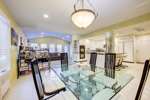 7015 170th St, Fresh Meadows, NY 11365 - dining room with vaulted ceiling, light tile patterned floors, radiator heating unit, and recessed lighting