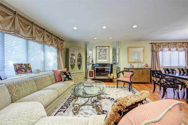 7015 170th St, Fresh Meadows, NY 11365 - living room with healthy amount of natural light, recessed lighting, and light wood-style floors