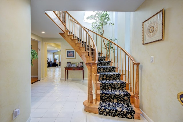 7015 170th St, Fresh Meadows, NY 11365 - stairway with baseboards and tile patterned floors