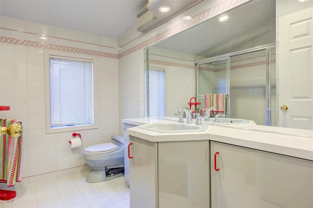 7015 170th St, Fresh Meadows, NY 11365 - bathroom featuring tile walls, tile patterned flooring, vanity, and tiled shower