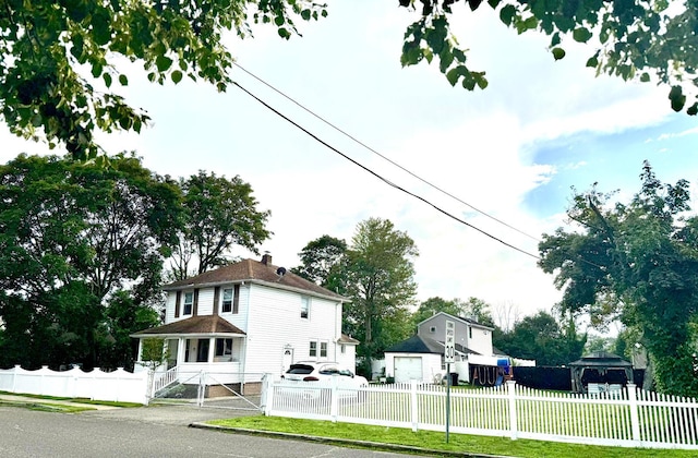 90 Redmond Ave, Bay Shore, NY 11706 - view of property exterior featuring a chimney and a gazebo