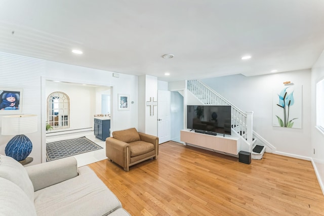 90 Redmond Ave, Bay Shore, NY 11706 - living room featuring stairway, light wood-style floors, and recessed lighting