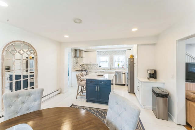 90 Redmond Ave, Bay Shore, NY 11706 - dining space featuring a baseboard heating unit, light tile patterned floors, and recessed lighting