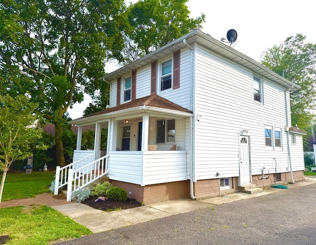 90 Redmond Ave, Bay Shore, NY 11706 - view of front of home featuring a porch